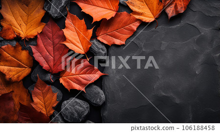 Autumn leaves lie on the dark stone floor, there is room for text. High quality photo 106188458