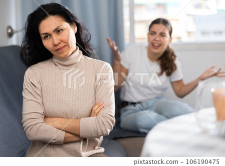 Two women having quarrel at home 106190475