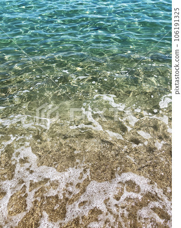 Waves crashing on the beautiful white sandy beach of the Sea of Japan 106191325