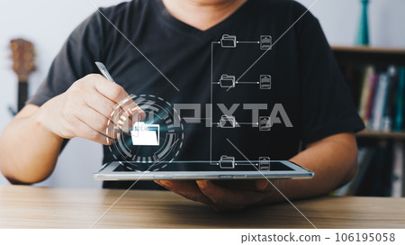 man touch screen to manage data,Document Management System (DMS),knowledge and documentation in enterprise with ERP.online documentation database and process automation to efficiently manage files. 106195058