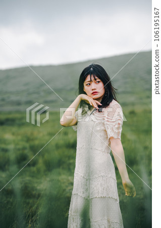 Meadow and white dress woman Meadow and white dress woman 106195167
