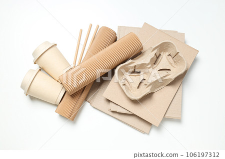 The concept of recycling kraft cardboard. Smart use of resources. The concept of recycling kraft cardboard. Smart use of resources. 106197312