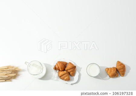 Breakfast tasty food concept - milk with bakery products 106197328