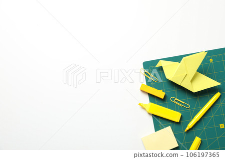 Patchwork accessories concept on white background, cutting mat 106197365