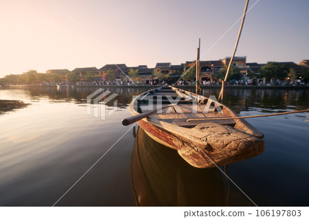 Close-up wooden boat moored in ancient city Hoi An. Close-up wooden boat moored in ancient city Hoi An. 106197803
