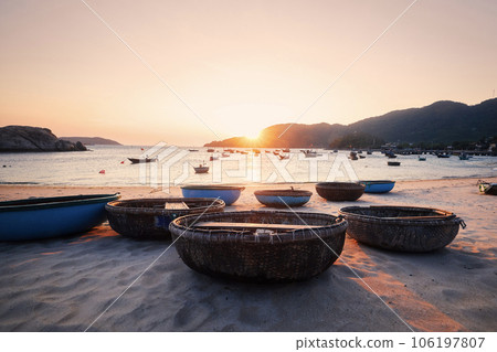 Basket boats on sand beach in Vietnam. 106197807