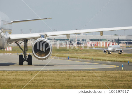 Hot air behind jet engine of plane at airport. 106197917