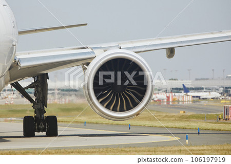 Hot air behind jet engine of plane at airport. 106197919