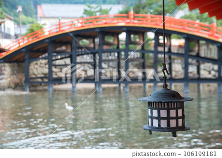 Hanging lanterns and Sorihashi Bridge at Itsukushima Shrine 106199181