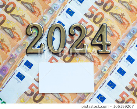 Background of the fifty euros banknotes and 2024 with copy space Background of the fifty euros banknotes and 2024 with copy space 106199207
