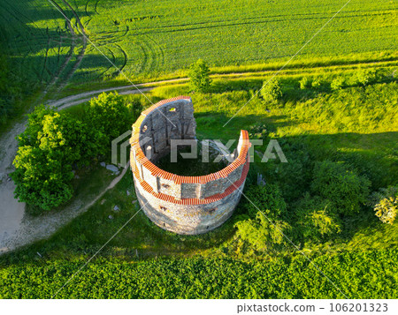Ruins of old rural windmill in Pricovy near Sedlcany. The largest Dutch type mill. Czech Republic. Aerial view from drone. Ruins of old rural windmill in Pricovy near Sedlcany. The largest Dutch type mill. Czech Republic. Aerial view from drone. 106201323