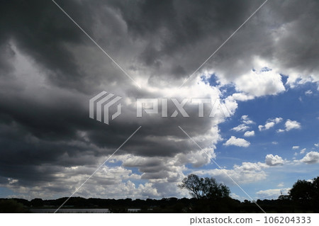 Rain clouds and blue sky Rain clouds and blue sky 106204333