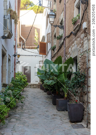 Cobblestone Streets of Tossa de Mar's Old Town, Spain Cobblestone Streets of Tossa de Mar's Old Town, Spain 106205408