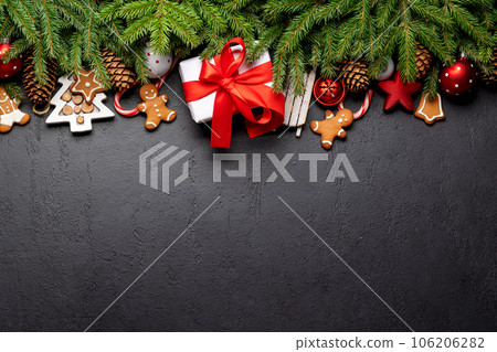 Xmas fir tree branch, Christmas gift box and space Xmas fir tree branch, Christmas gift box and space 106206282