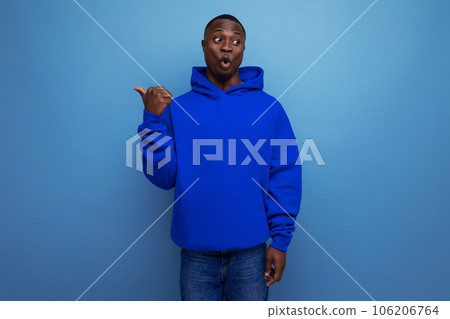 positive young african man with short haircut in casual clothes positive young african man with short haircut in casual clothes 106206764