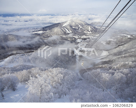 Ryuoo Ski Park in the harshest of winters, looking out over the ropeway and Mt. Kosha from the Sora Terrace 106206829