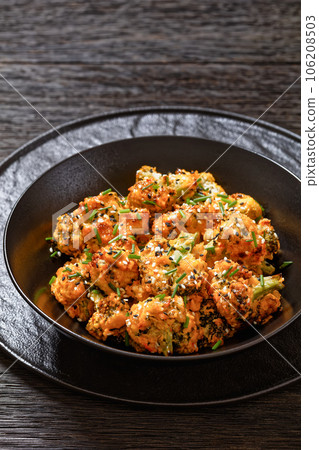 bang bang broccoli bites in bowl, top view 106208503