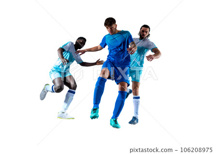 Isolated football  player plays with soccerball in a match Isolated football  player plays with soccerball in a match 106208975