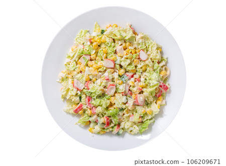 plate of salad with crab sticks, corn and vegetables isolated on white background plate of salad with crab sticks, corn and vegetables isolated on white background 106209671