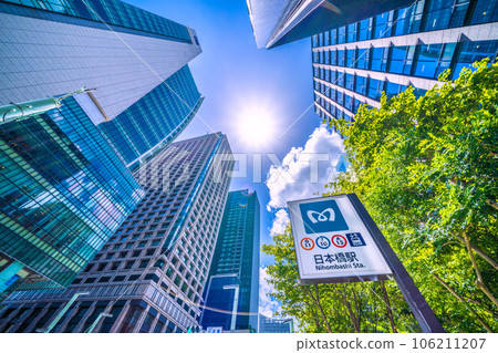 Tokyo cityscape in Japan Post-Corona / Light of hope ... Looking at buildings around Nihonbashi station and Nihonbashi intersection = August 10 106211207