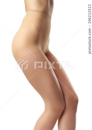 Legs of slim woman in tights on white background 106212815