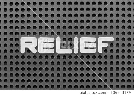 White alphabet letter in word relief on black pegboard background White alphabet letter in word relief on black pegboard background 106213179