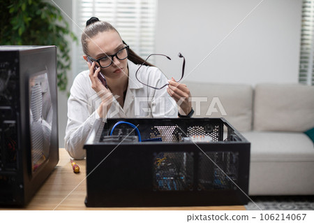 Girl tries to fix broken computer on her own Girl tries to fix broken computer on her own 106214067
