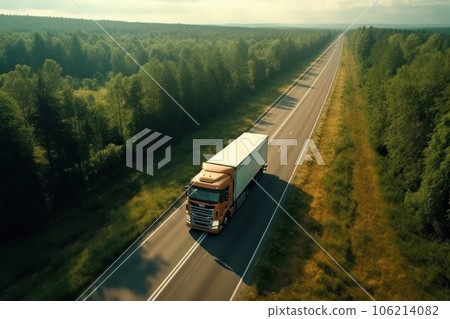 Truck driving on the asphalt road in forest Truck driving on the asphalt road in forest 106214082
