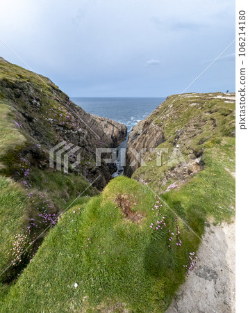 The sea cliffs and stacks at Malin Head. the Northern most point in Ireland 106214180