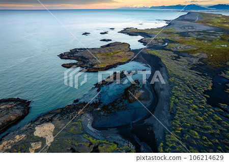 Landscape with Atlantic ocean and black sand beach in wilderness on summer at Iceland Landscape with Atlantic ocean and black sand beach in wilderness on summer at Iceland 106214629