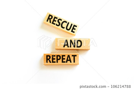 Rescue and repeat symbol. Concept words Rescue and repeat on wooden block on a beautiful white table white background. Business rescue and repeat concept. Copy space. Rescue and repeat symbol. Concept words Rescue and repeat on wooden block on a beautiful white table white background. Business rescue and repeat concept. Copy space. 106214788