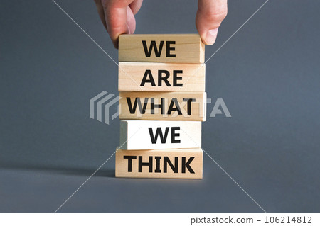 We are what we think symbol. Concept word We are what we think on wooden block. Beautiful grey table grey background. Businessman hand. Business We are what we think concept. Copy space. 106214812