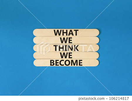 We become or think symbol. Concept word What we think We become on wooden stick. Beautiful blue table blue background. Business we become or think concept. Copy space. 106214817