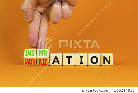 Inspiration or mobilization symbol. Concept words Inspiration and Mobilization on wooden cubes. Beautiful orange background. Psychologist hand. Psychology inspiration mobilization concept. Copy space. 106214833