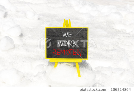We work remotely symbol. Concept words We work remotely on beautiful black chalk blackboard. Beautiful snow background. Business we work remotely remote work concept. Copy space. We work remotely symbol. Concept words We work remotely on beautiful black chalk blackboard. Beautiful snow background. Business we work remotely remote work concept. Copy space. 106214864