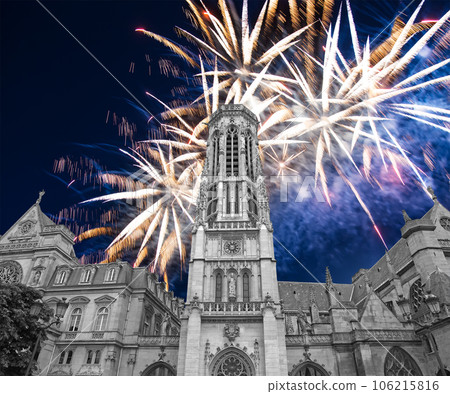 Celebratory fireworks over the Great gothic church of Saint Germain l Auxerrois, Paris, France 106215816