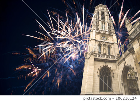 Celebratory fireworks over the Great gothic church of Saint Germain l Auxerrois, Paris, France Celebratory fireworks over the Great gothic church of Saint Germain l Auxerrois, Paris, France 106216124