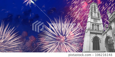 Celebratory fireworks over the Great gothic church of Saint Germain l Auxerrois, Paris, France 106216148