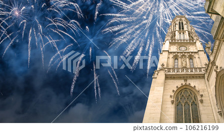 Celebratory fireworks over the Great gothic church of Saint Germain l Auxerrois, Paris, France 106216199