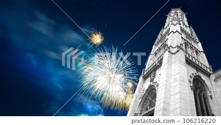 Celebratory fireworks over the Great gothic church of Saint Germain l Auxerrois, Paris, France Celebratory fireworks over the Great gothic church of Saint Germain l Auxerrois, Paris, France 106216220