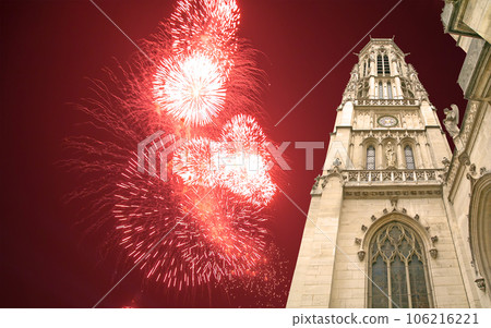 Celebratory fireworks over the Great gothic church of Saint Germain l Auxerrois, Paris, France Celebratory fireworks over the Great gothic church of Saint Germain l Auxerrois, Paris, France 106216221