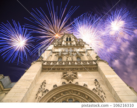 Celebratory fireworks over the Great gothic church of Saint Germain l Auxerrois, Paris, France Celebratory fireworks over the Great gothic church of Saint Germain l Auxerrois, Paris, France 106216310