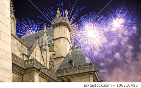 Celebratory fireworks over the Great gothic church of Saint Germain l Auxerrois, Paris, France Celebratory fireworks over the Great gothic church of Saint Germain l Auxerrois, Paris, France 106216458