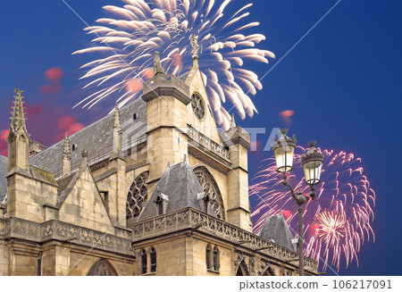 Celebratory fireworks over the Great gothic church of Saint Germain l Auxerrois, Paris, France Celebratory fireworks over the Great gothic church of Saint Germain l Auxerrois, Paris, France 106217091