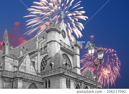Celebratory fireworks over the Great gothic church of Saint Germain l Auxerrois, Paris, France 106217092