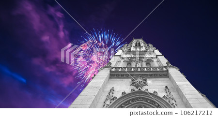 Celebratory fireworks over the Great gothic church of Saint Germain l Auxerrois, Paris, France Celebratory fireworks over the Great gothic church of Saint Germain l Auxerrois, Paris, France 106217212