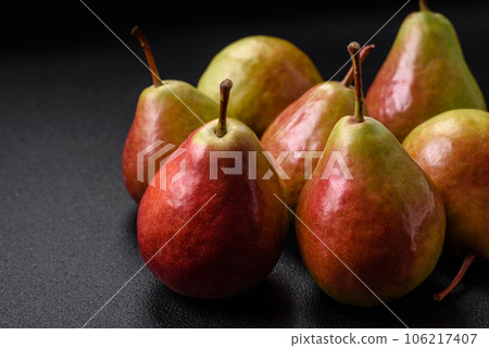 Delicious juicy sweet green pear with red side Delicious juicy sweet green pear with red side 106217407