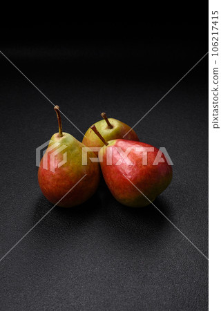 Delicious juicy sweet green pear with red side 106217415