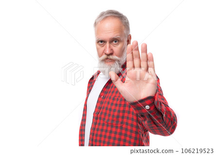 handsome mature gray-haired man with beard won shows stop handsome mature gray-haired man with beard won shows stop 106219523
