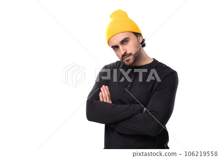 young smart brunette caucasian male model with beard dressed casual on white background with copy 106219558
